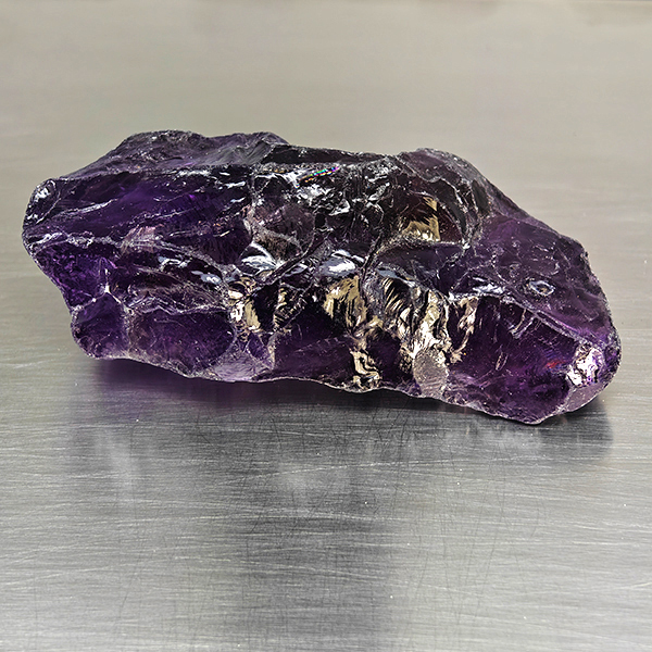 Natural Purple Amethyst Gemstones 297.23 Ct. Rough Shape 63 x 26 Mm. Natural Purple Amethyst Gemstones 297.23 Ct. Rough Shape 63 x 26 Mm.