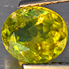 Natural Intense Green Titanium With Rainbow Spark Sphene 1.20 Ct. Oval Shape 7.5 x 6.8 Mm Gemstone Natural Intense Green Titanium With Rainbow Spark Sphene 1.20 Ct. Oval Shape 7.5 x 6.8 Mm Gemstone